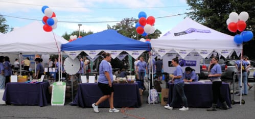 The booths and volunteers of Sheryl's Den Animal Rescue